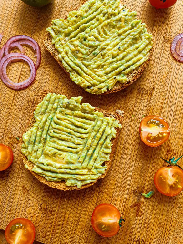 Avocado toast, cherry tomatoes, hemp seeds, whole meal bread, toast